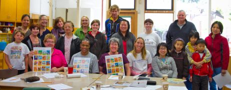 About 20 volunteers for the Alemany Island mural painting class
